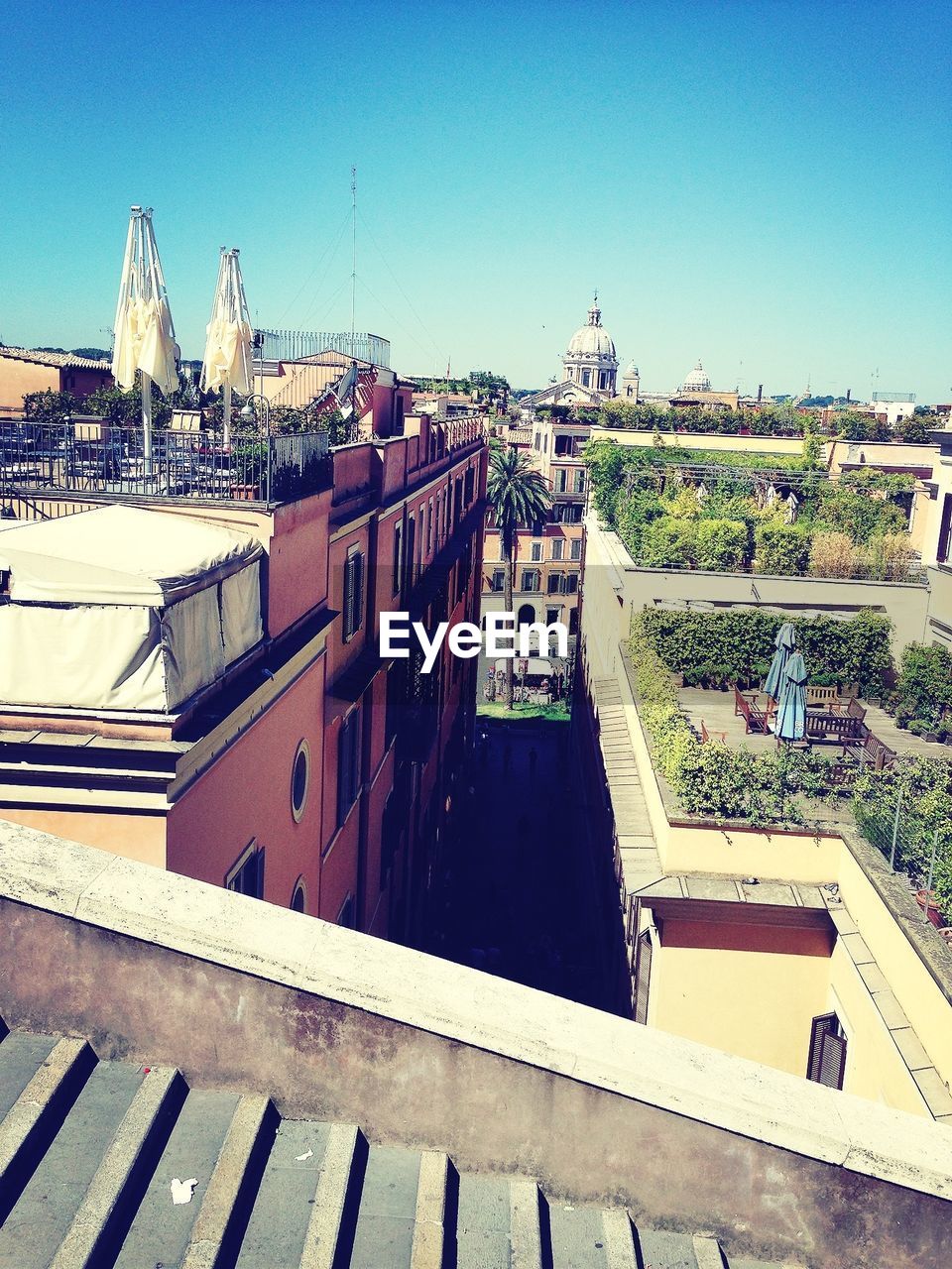 VIEW OF BUILDINGS AGAINST BLUE SKY