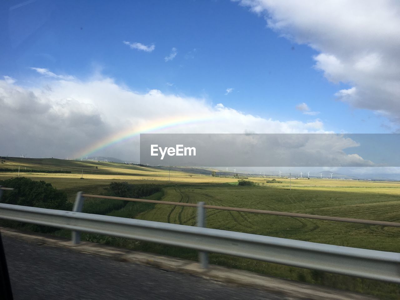 SCENIC VIEW OF RAINBOW AGAINST SKY