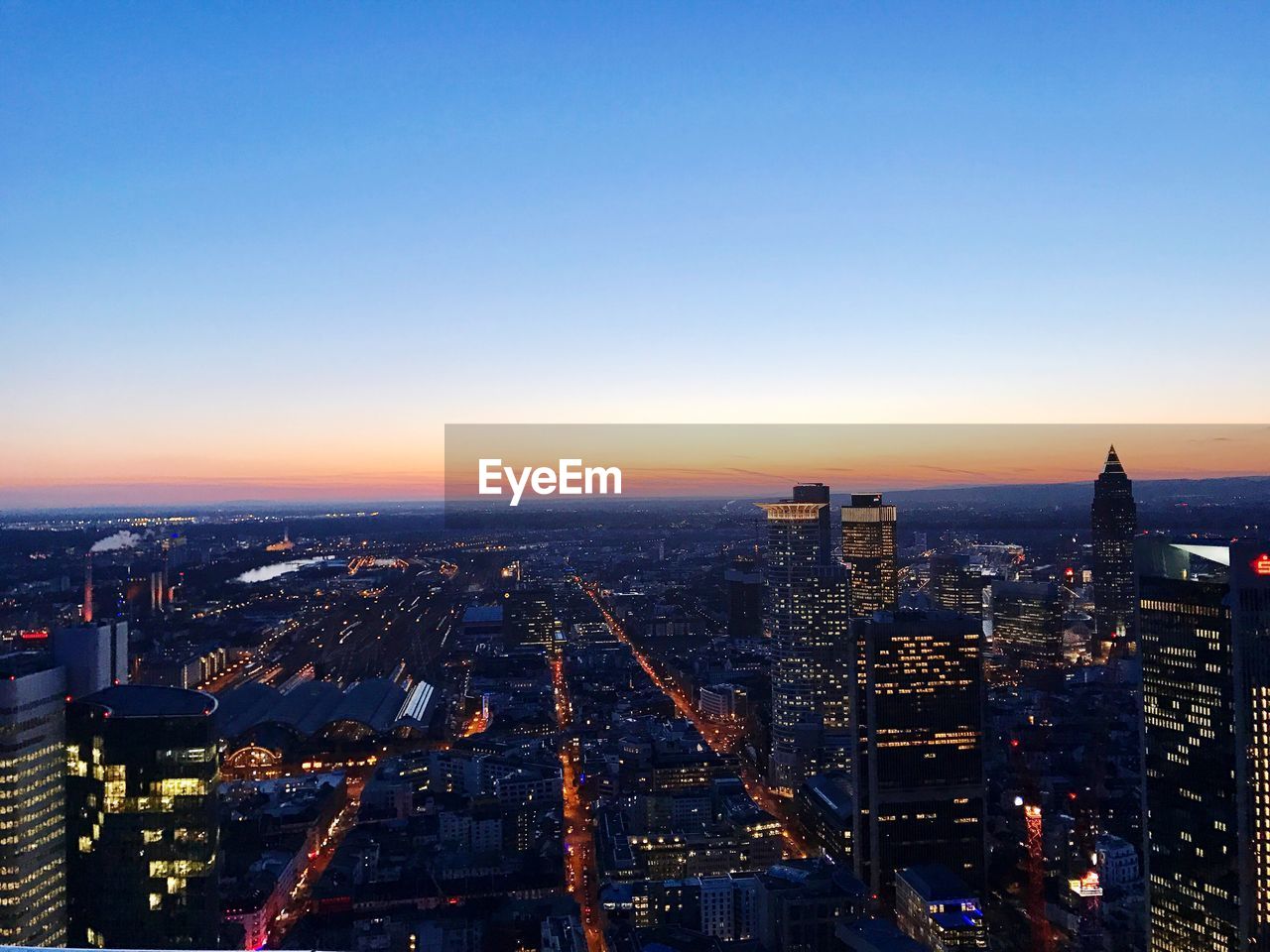 High angle view of city buildings during sunset