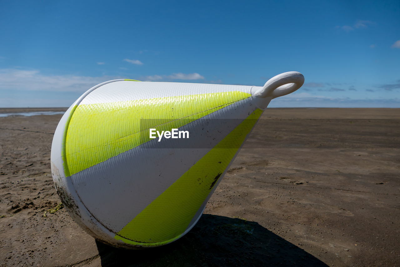 Position buoy on the beach