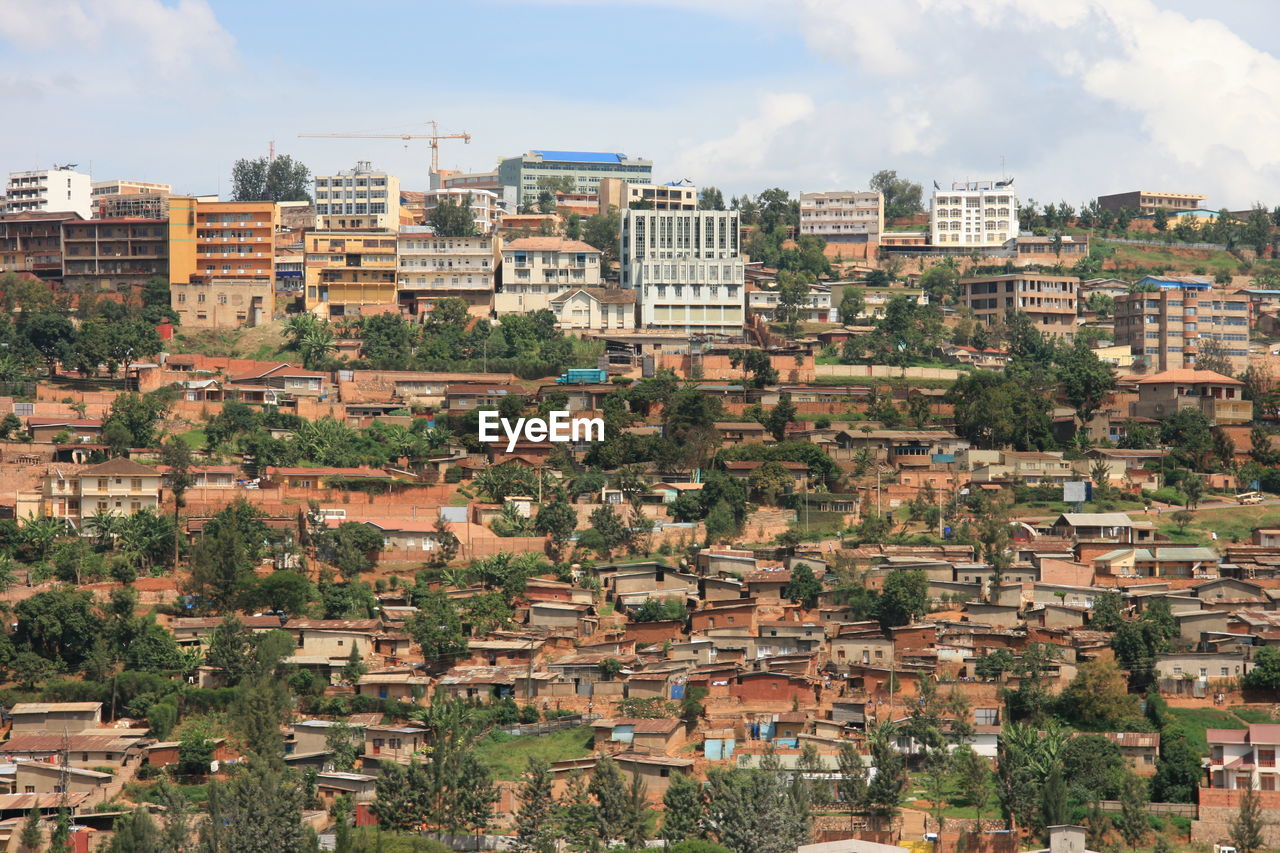 Landscape urban scene of shanty town and housing in hills of kigali, rwanda.