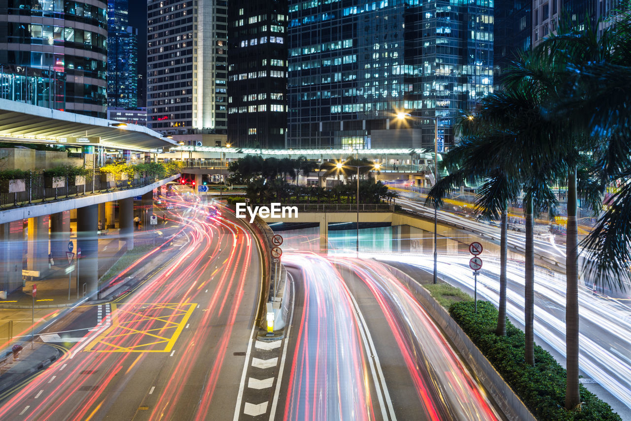 High angle view of light trails on road at night