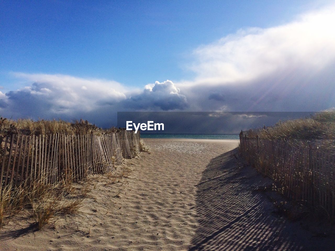 BEACH AGAINST SKY