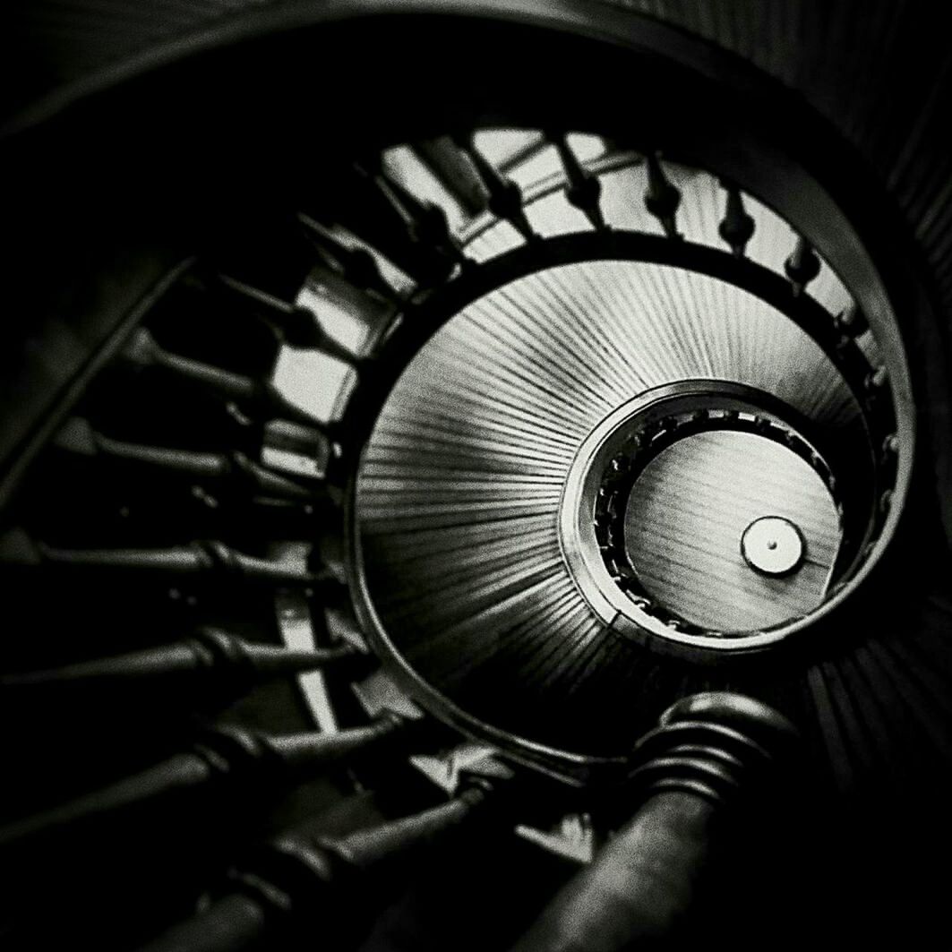 CLOSE UP OF SPIRAL STAIRCASE