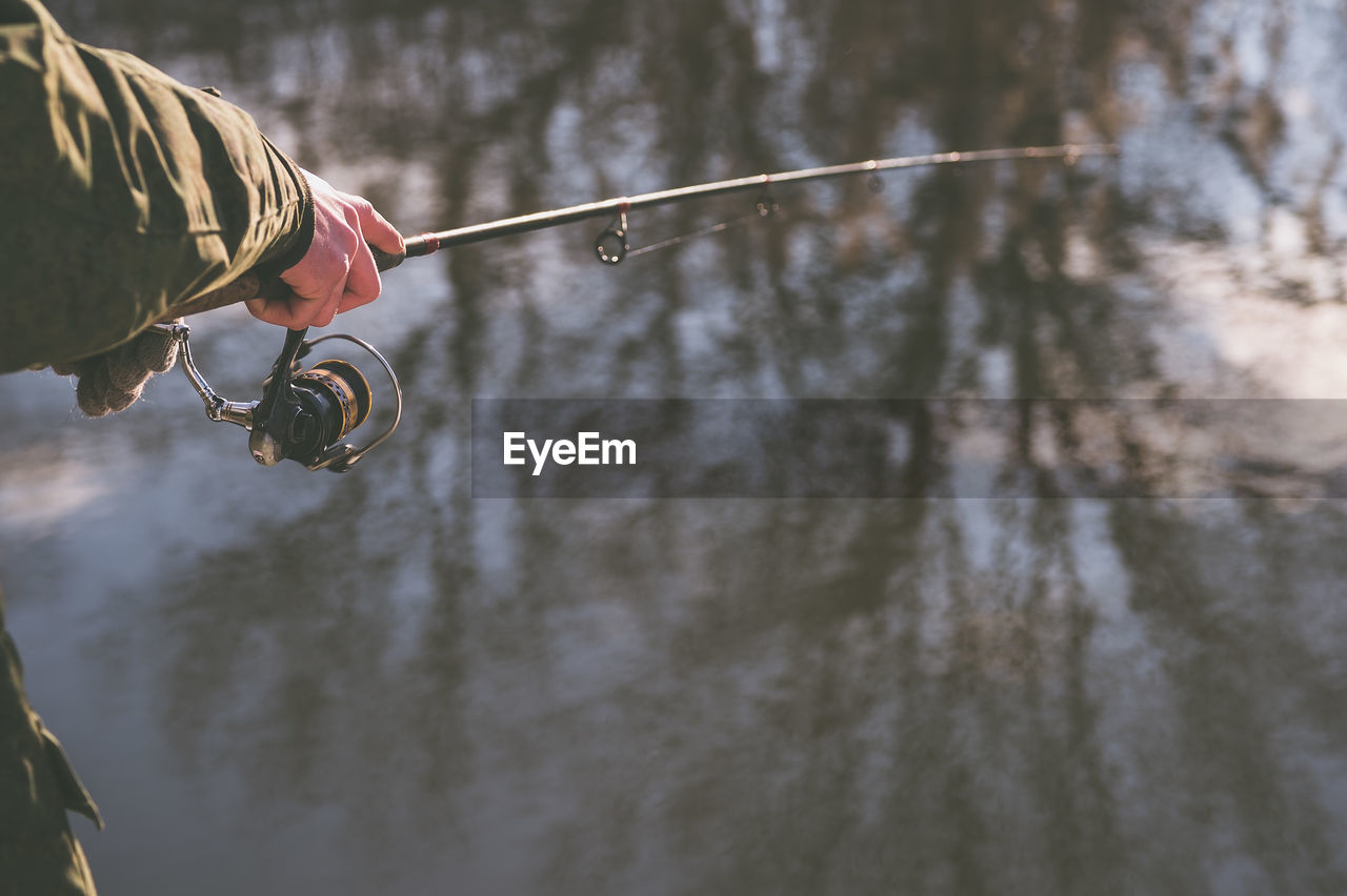 low angle view of man standing in lake