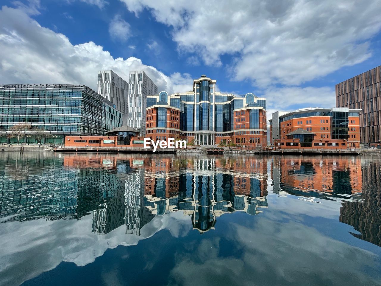 REFLECTION OF BUILDINGS IN WATER