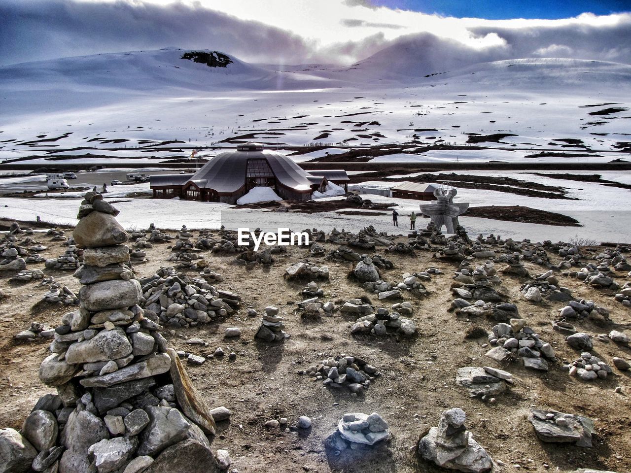 SCENIC VIEW OF FROZEN LANDSCAPE AGAINST SKY