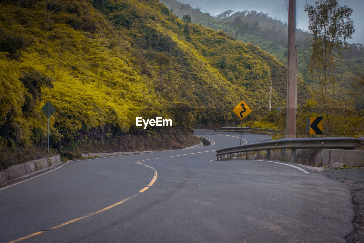 Road leading towards mountains