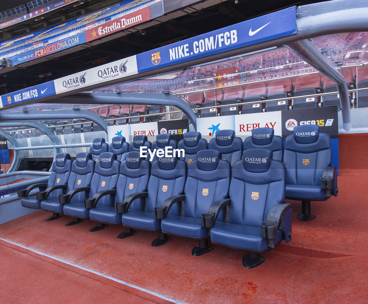 VIEW OF EMPTY SEATS IN ROW AT STADIUM