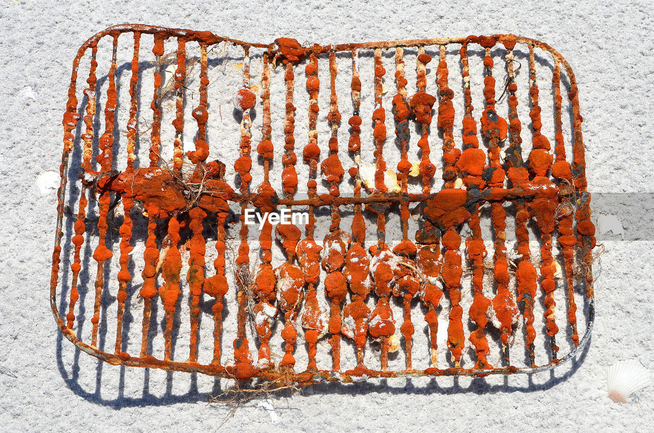 High angle view of rusty metal at beach