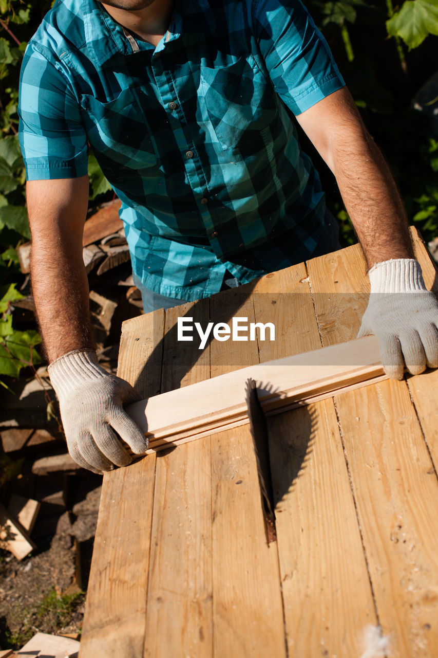 Man working on wood