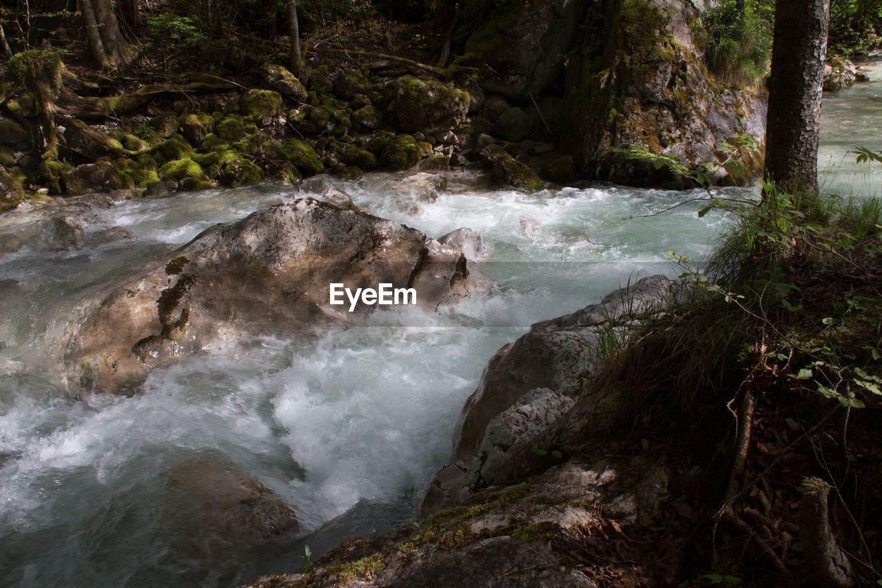 WATER SPLASHING ON WATERFALL