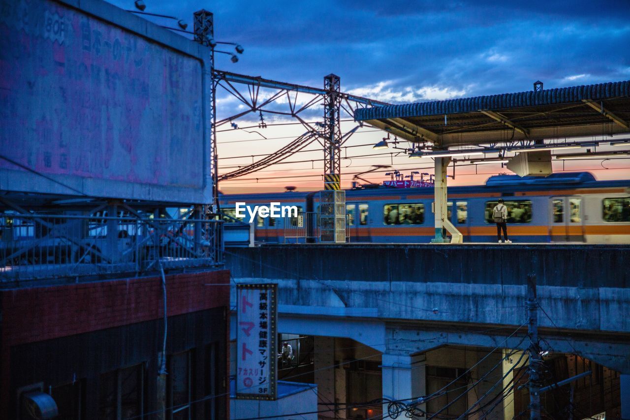 TRAIN AGAINST SKY