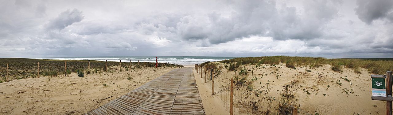 PANORAMIC SHOT OF BEACH AGAINST SKY