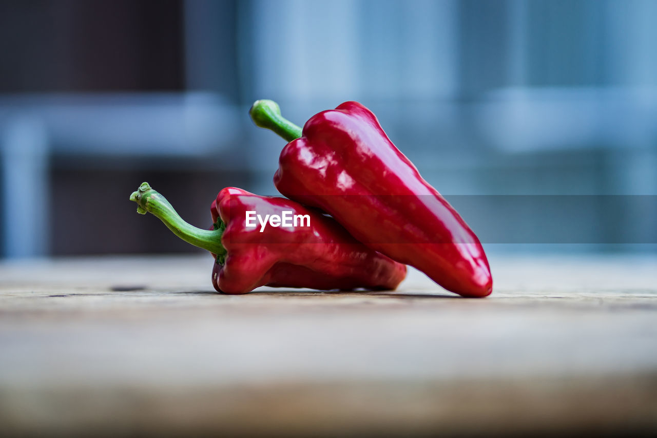 CLOSE-UP OF RED CHILI PEPPERS WITH BELL PEPPER