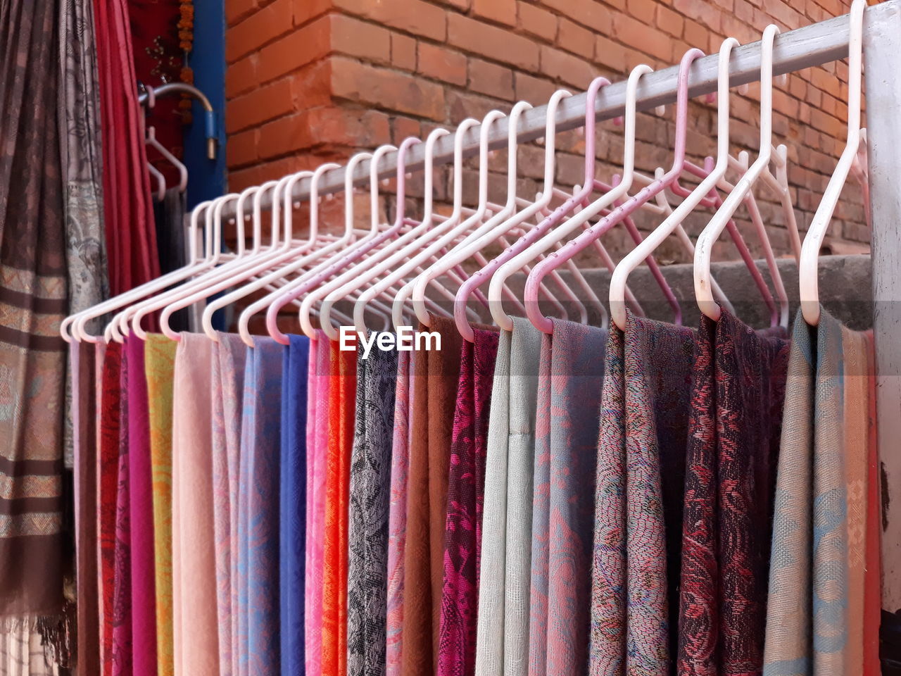 Close-up of multi colored clothing in store