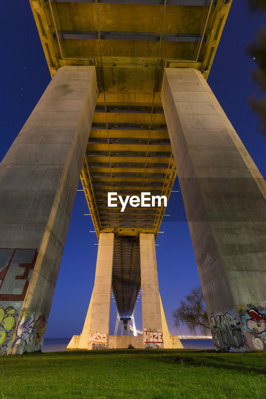 Low angle view of bridge at night