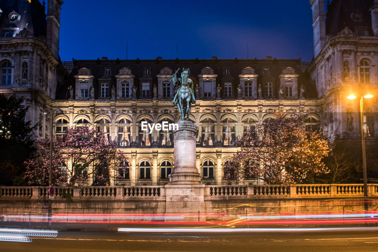 Blurred motion of illuminated building at night