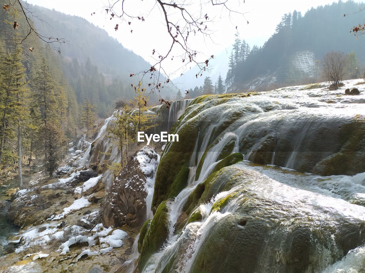 Beautiful view of waterfall in jiuzhaigou national park in china, the heaven on the earth with snow