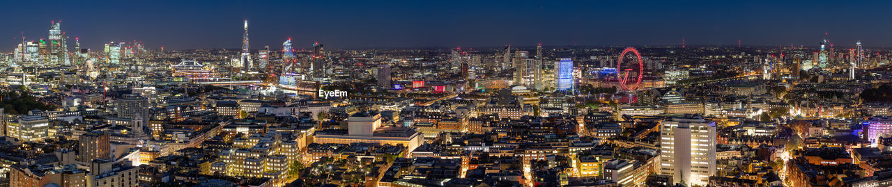 The london skyline panorama illuminated at night