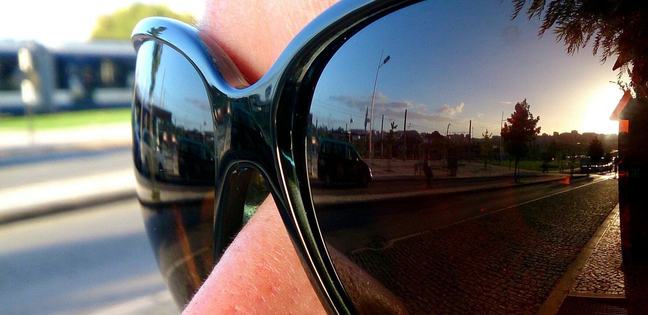 Close-up of woman wearing sunglasses