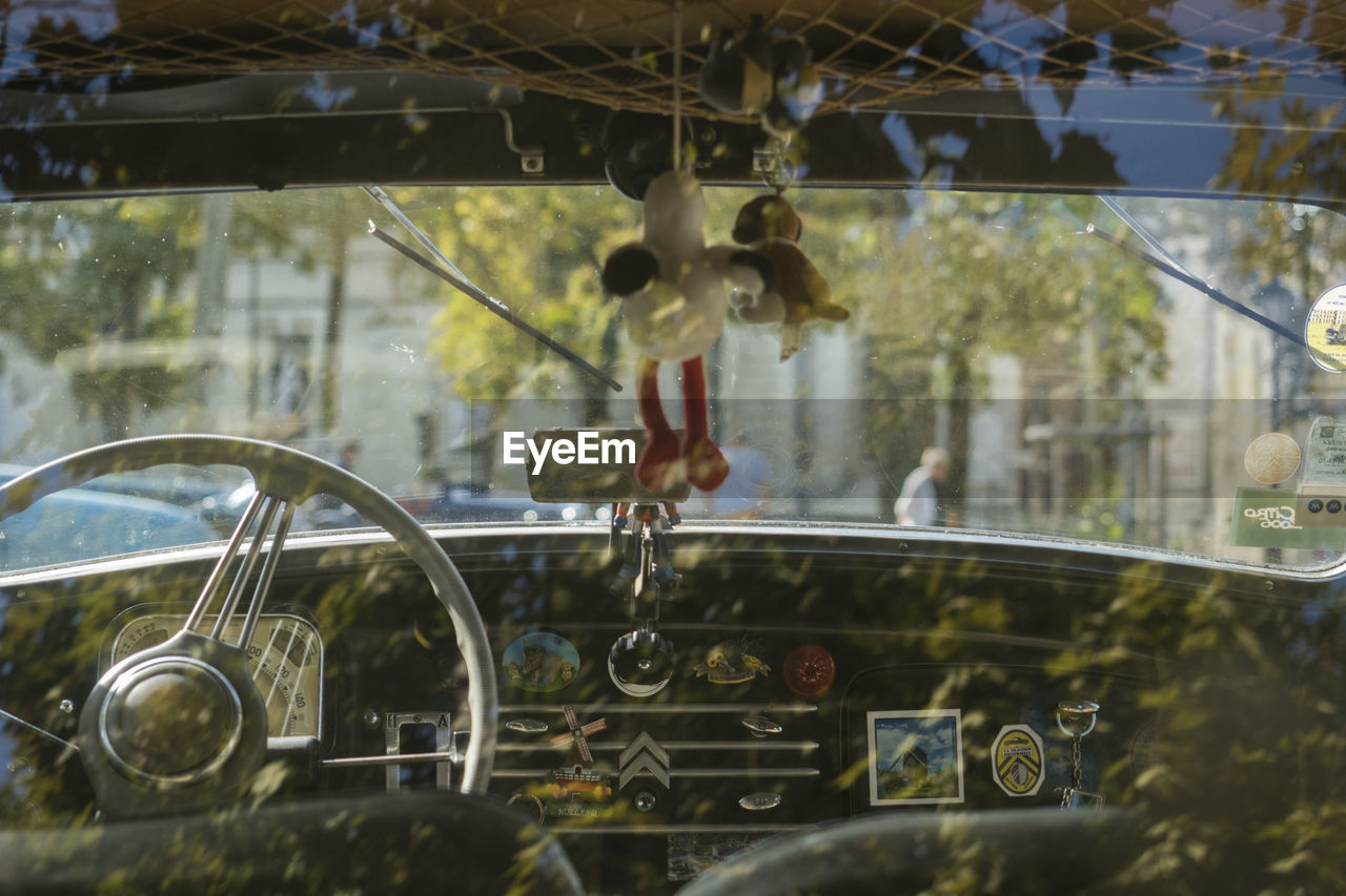 Toy hanging in vintage car