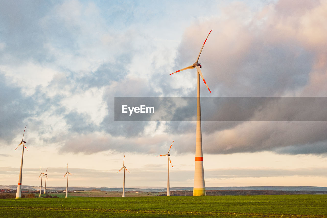 WIND TURBINES ON FIELD