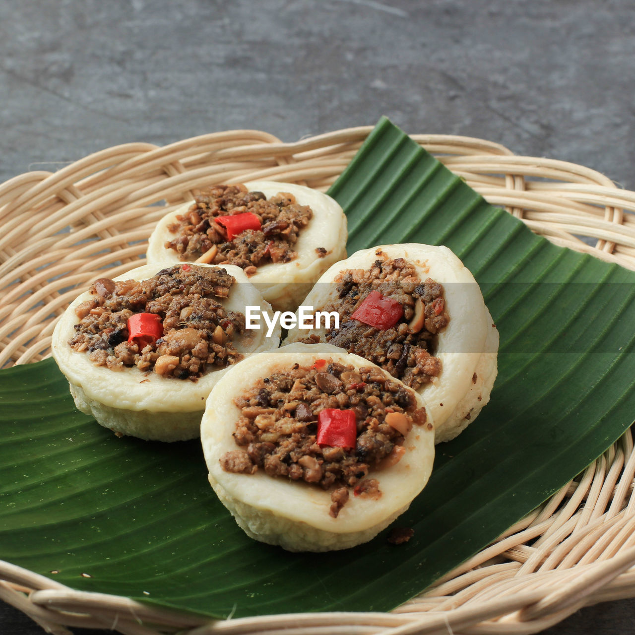 Selected focus kue talam oncom, traditional steamed cup cake from indonesia 