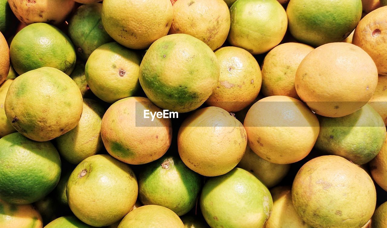 Full frame shot of lemons for sale at market