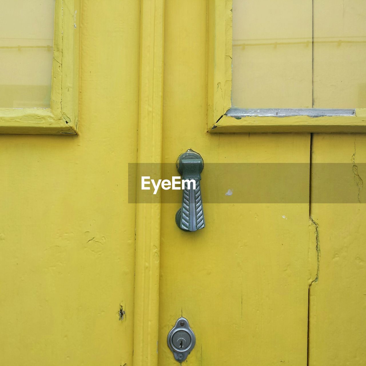 Full frame shot of yellow wooden door