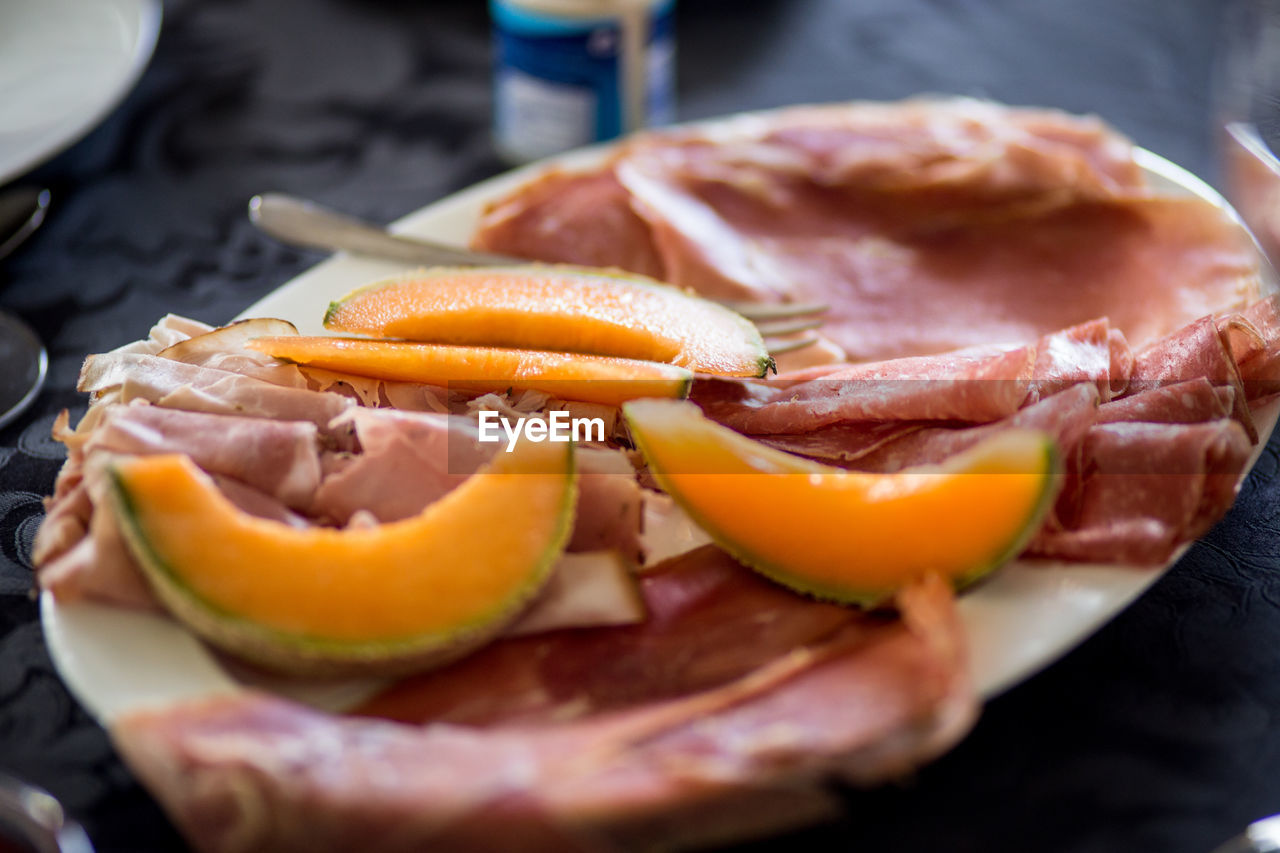 Close-up of meat served in plate on table