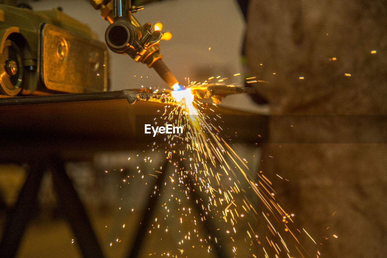 Close-up of metal cutting at factory