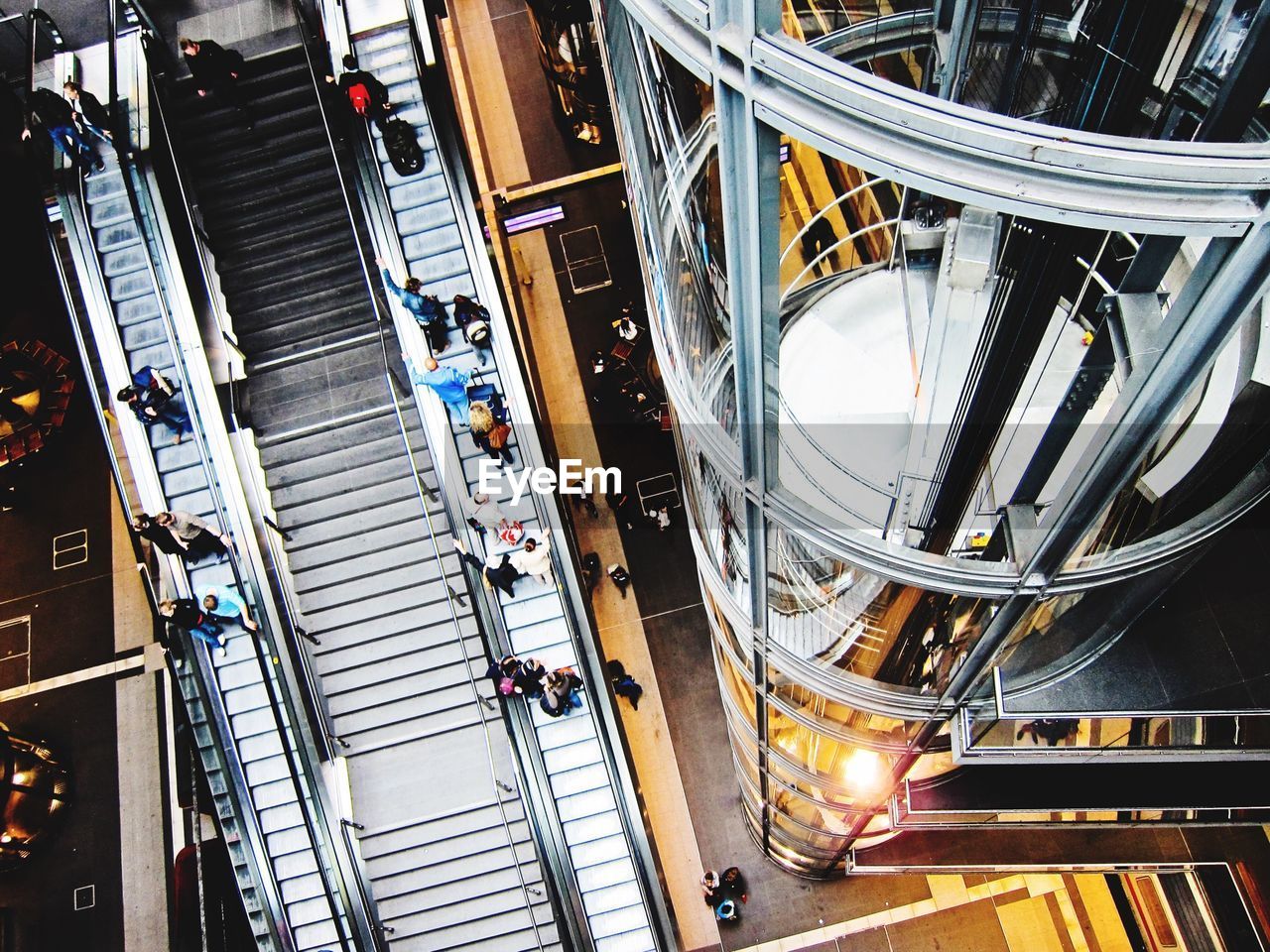 High angle view of people on escalators