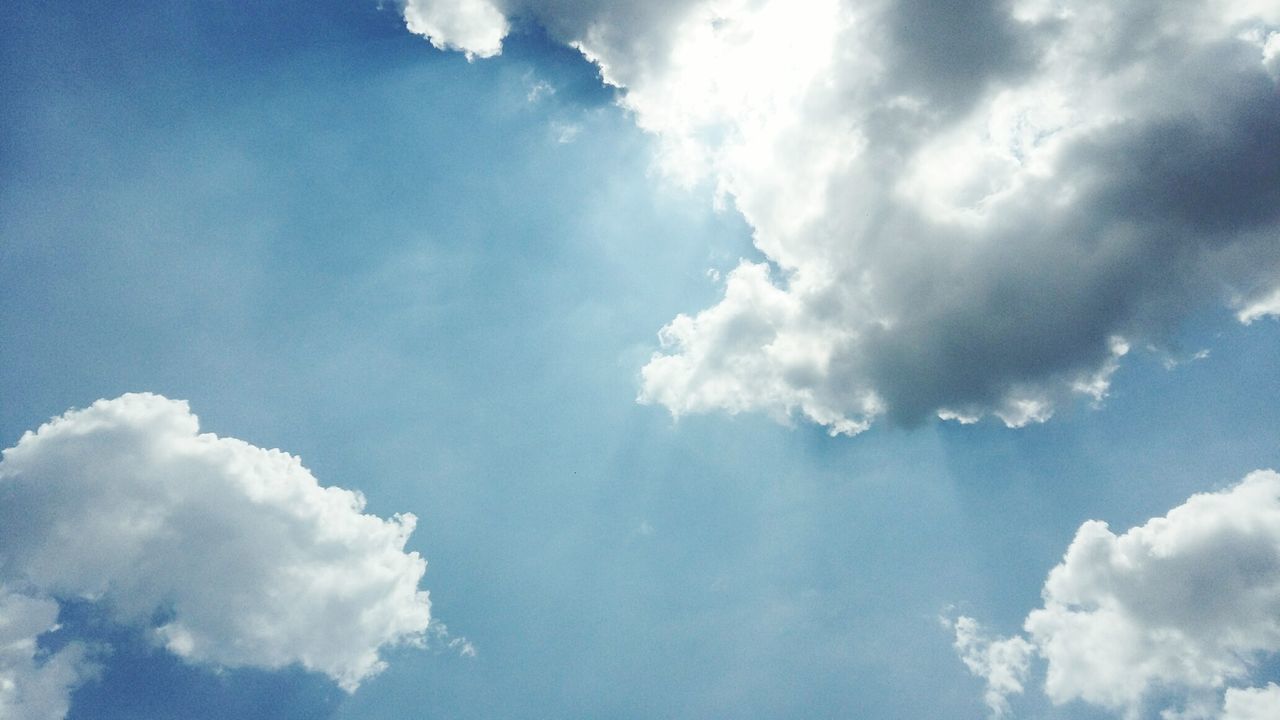 LOW ANGLE VIEW OF CLOUDS IN BLUE SKY