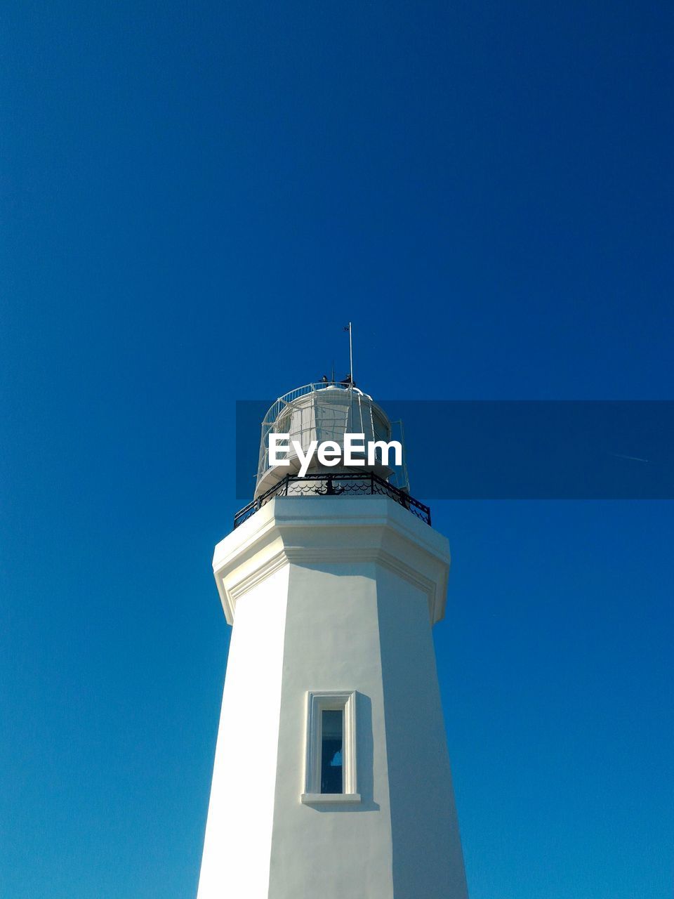 Low angle view of lighthouse against clear sky