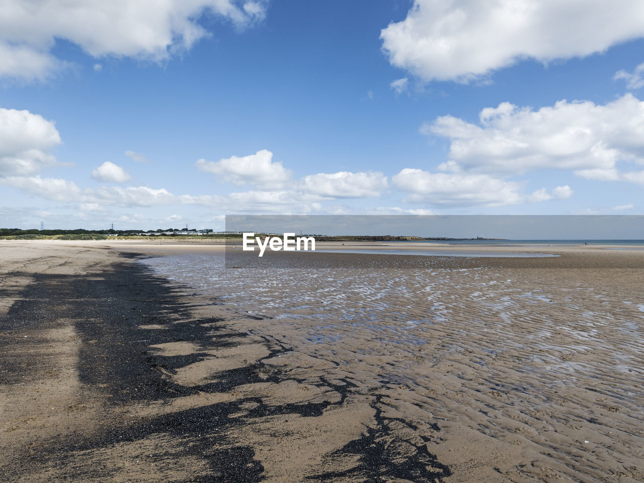 VIEW OF BEACH AGAINST SKY