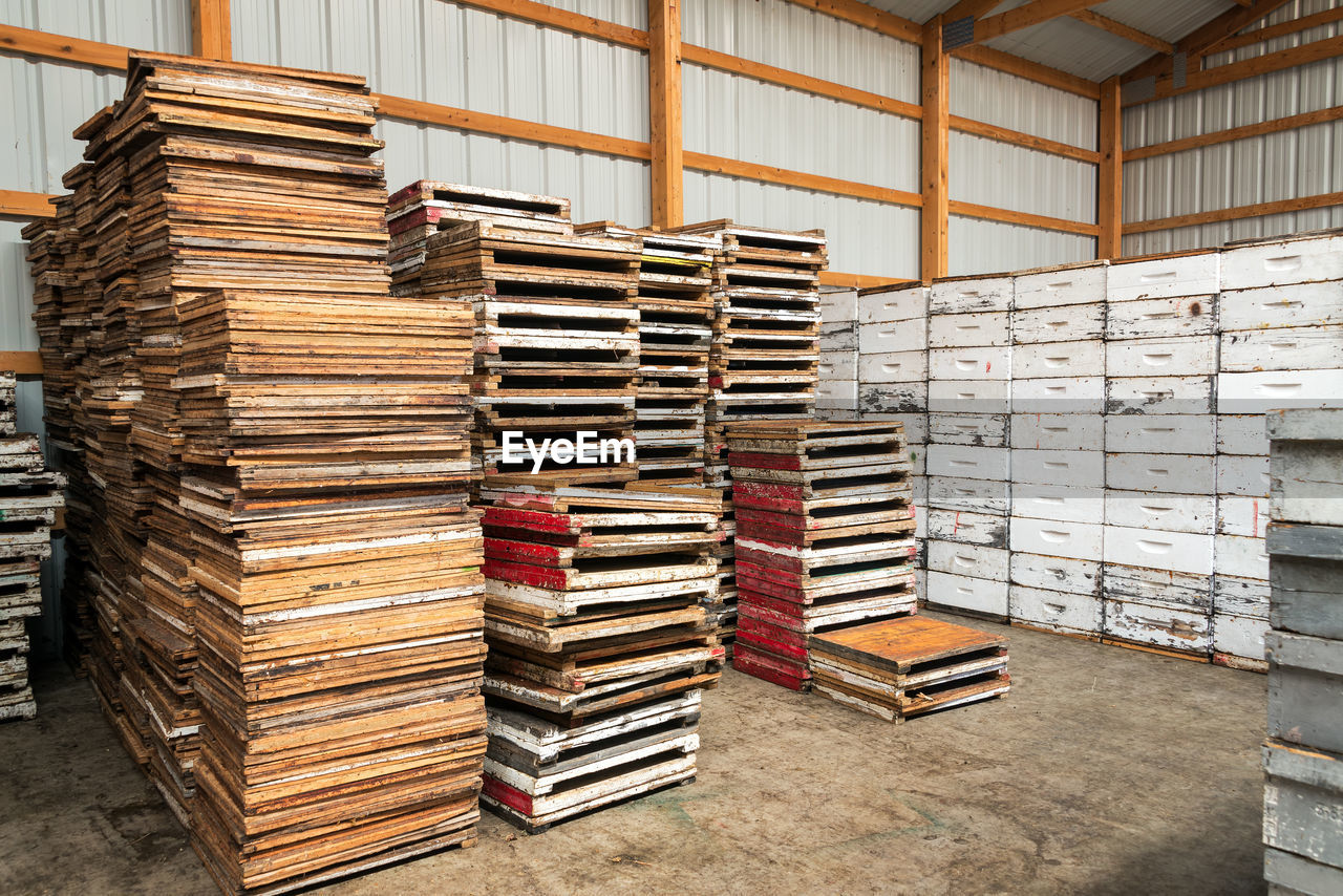 Stacks of beekeeping equipment at workshop