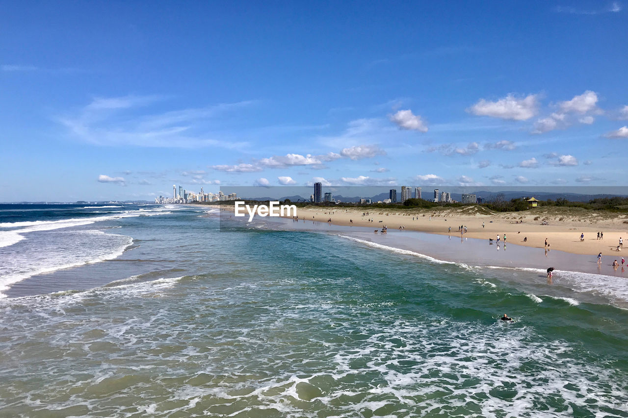 View of beach against blue sky