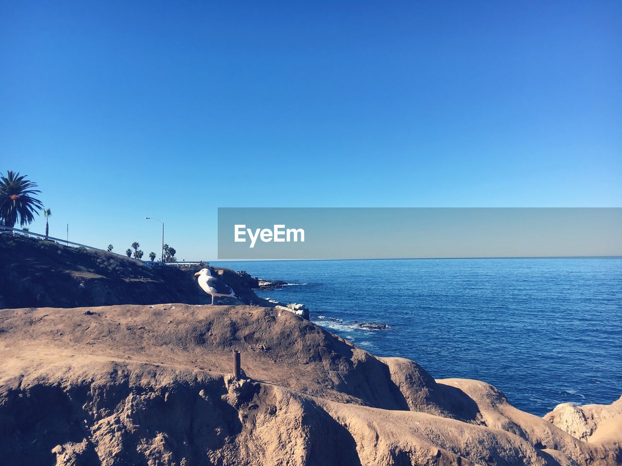 SCENIC VIEW OF SEA AGAINST BLUE SKY