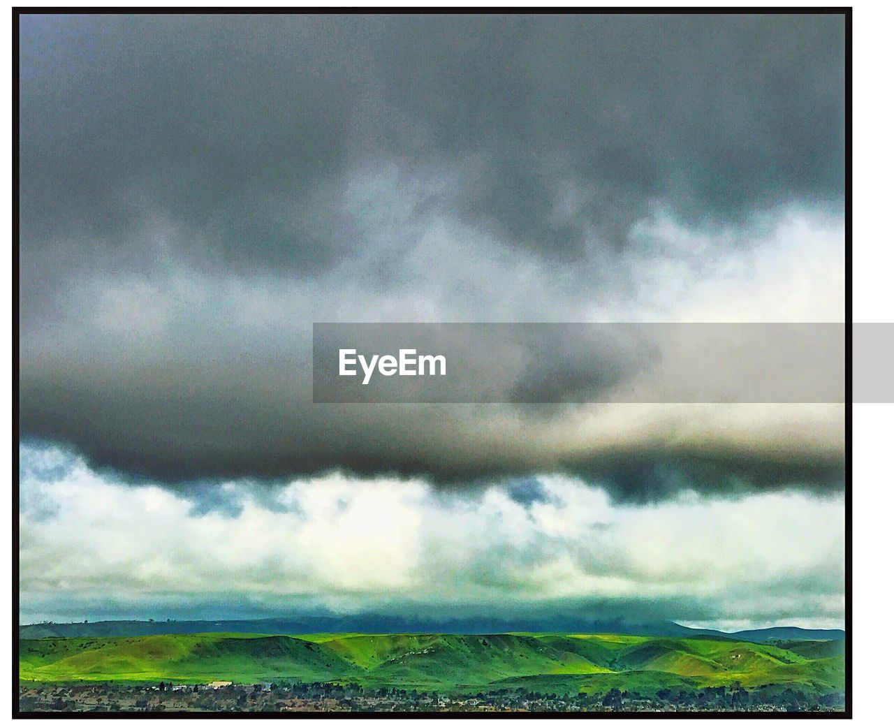 SCENIC VIEW OF SKY OVER LANDSCAPE AGAINST THE BACKGROUND