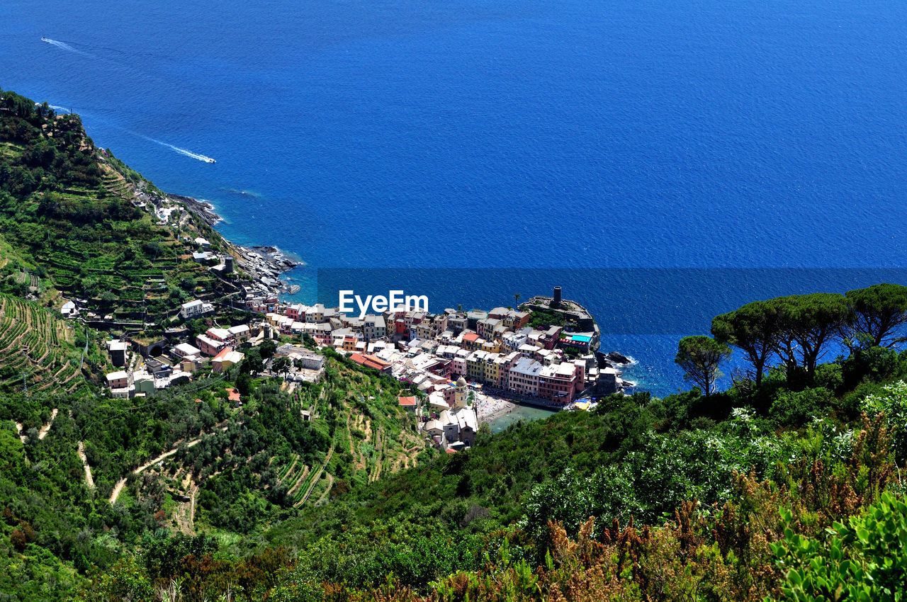 High angle view of townscape by sea