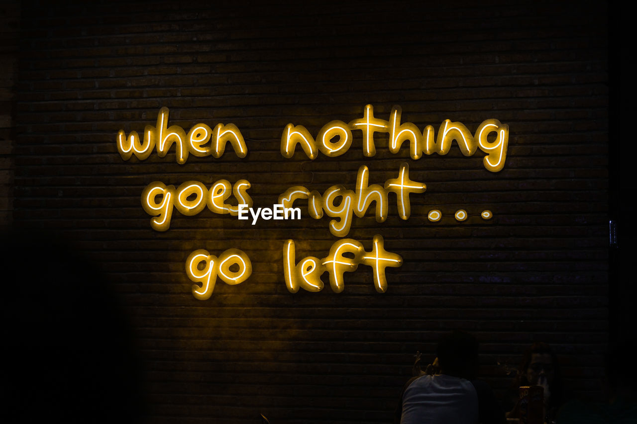 Illuminated message on wall