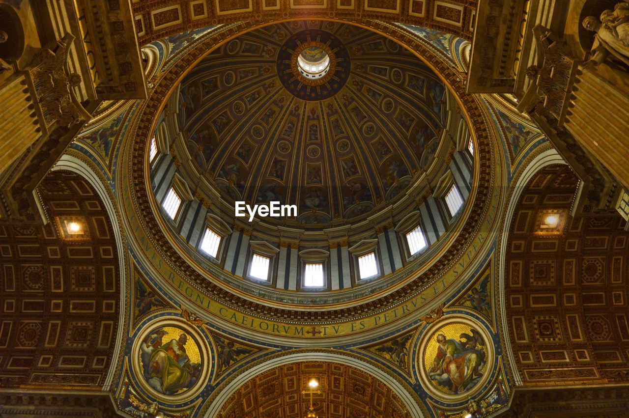 Low angle view of illuminated ceiling of building