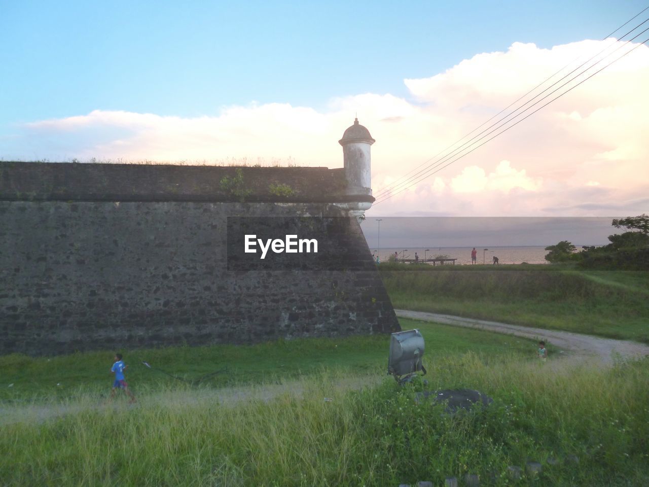 VIEW OF FARM AGAINST SKY