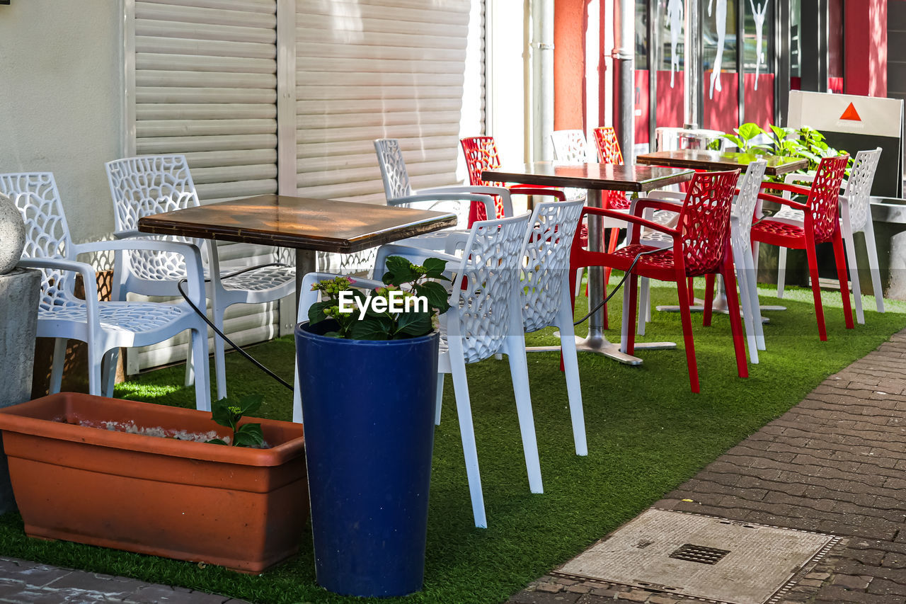 Empty outdoor restaurant table and chairs during covid lockdowns.