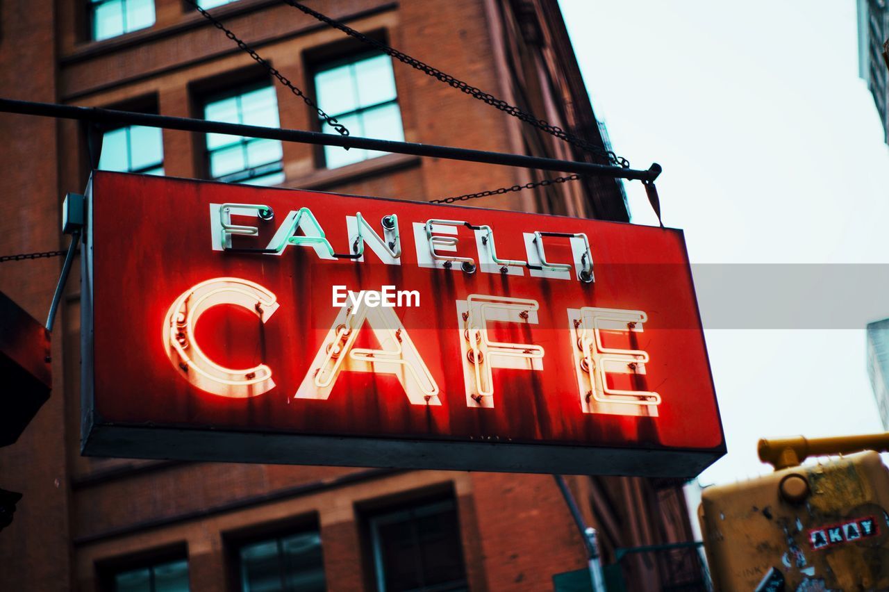 LOW ANGLE VIEW OF SIGNBOARD