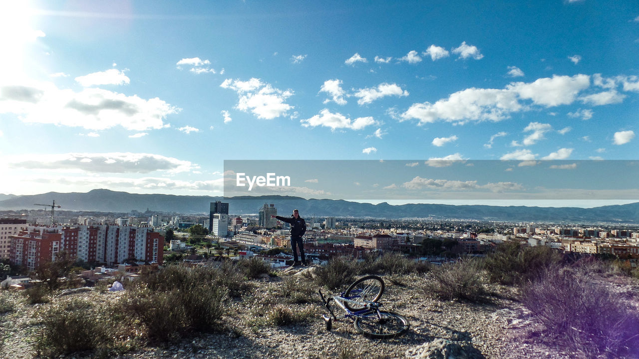 SCENIC VIEW OF CITY AND BUILDINGS