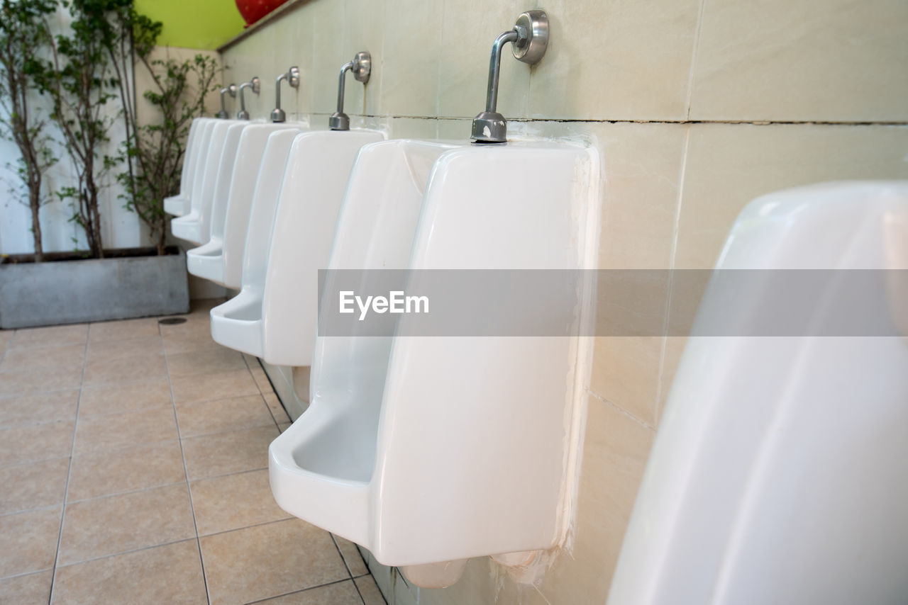 Urinals in public bathroom