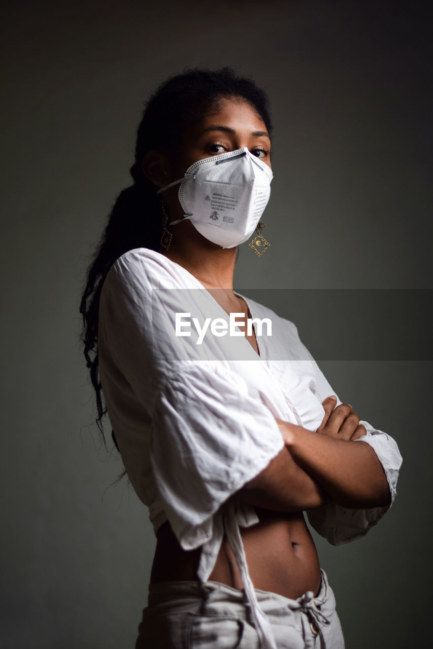 Young woman with a face mask