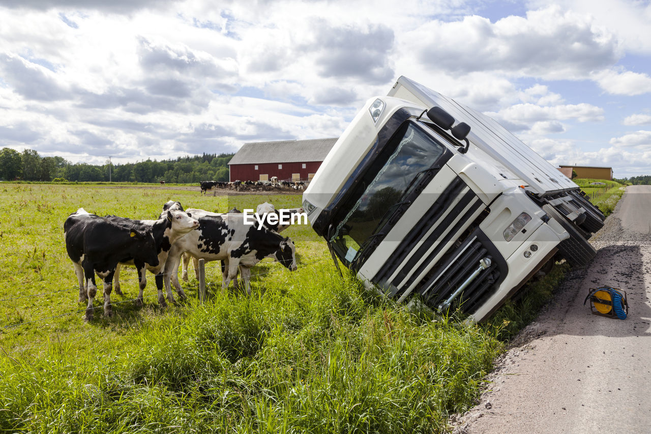 Overturned lorry on road side